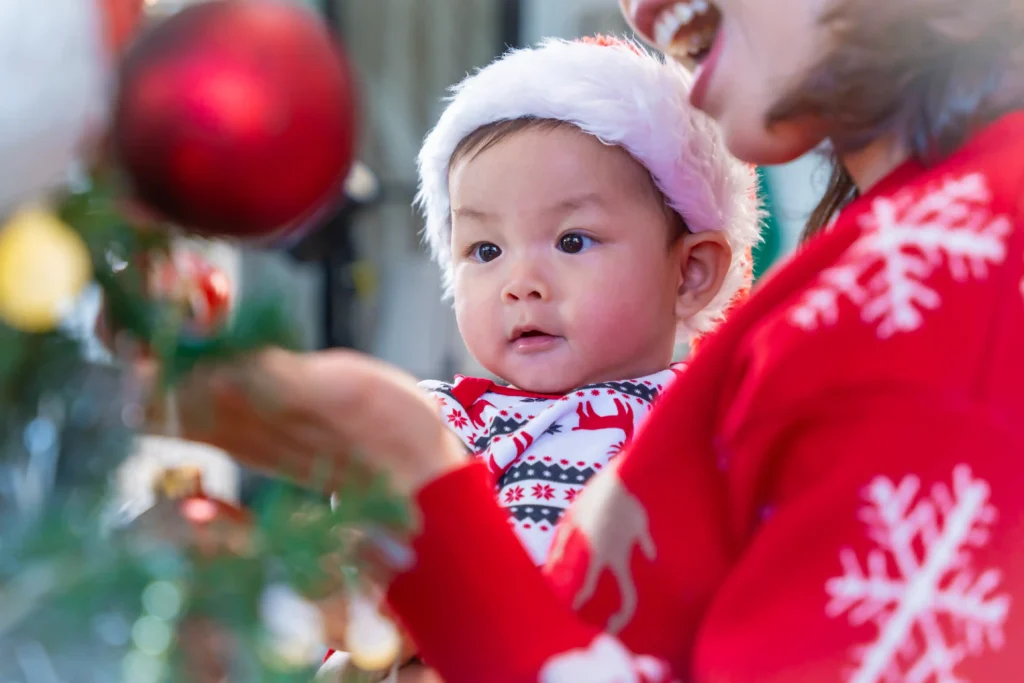 baby with Christmas tree